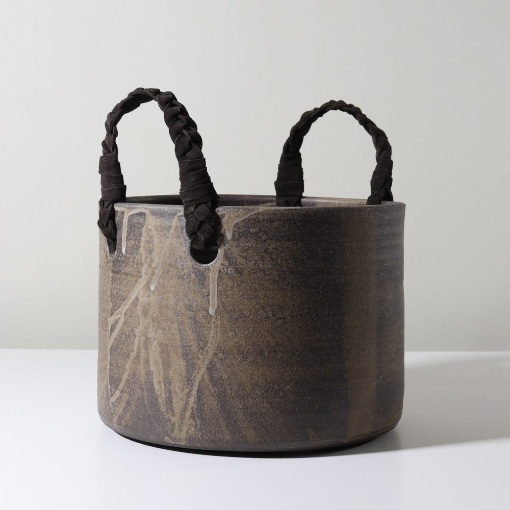 brown taupe hand made ceramic pottery basket pot with braided leather handles large