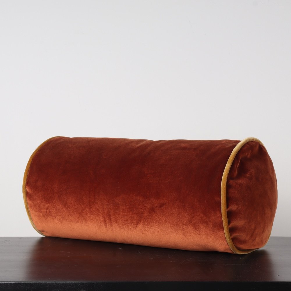 velvet burnt orange bolster pillow with mustard welt