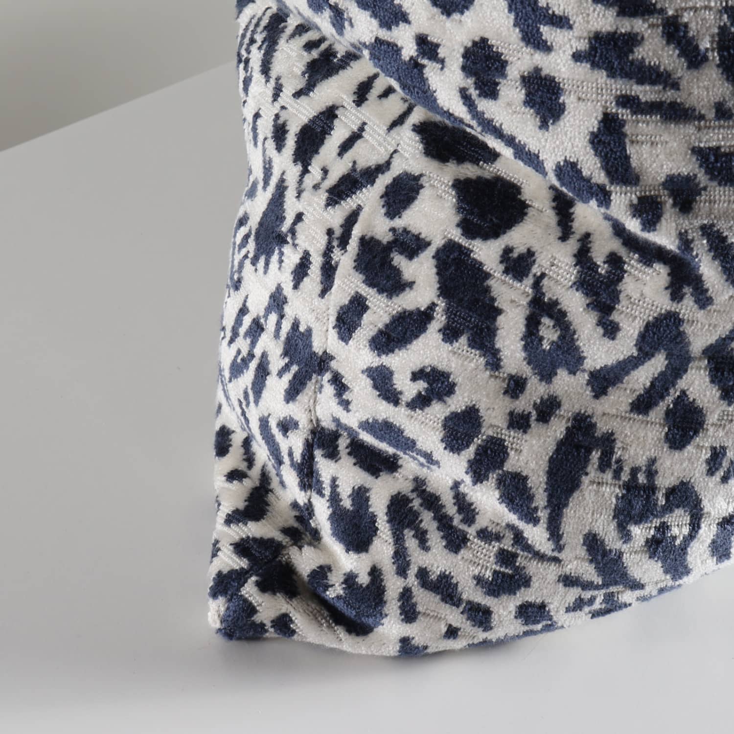 navy abstract animal print woven pillow 2